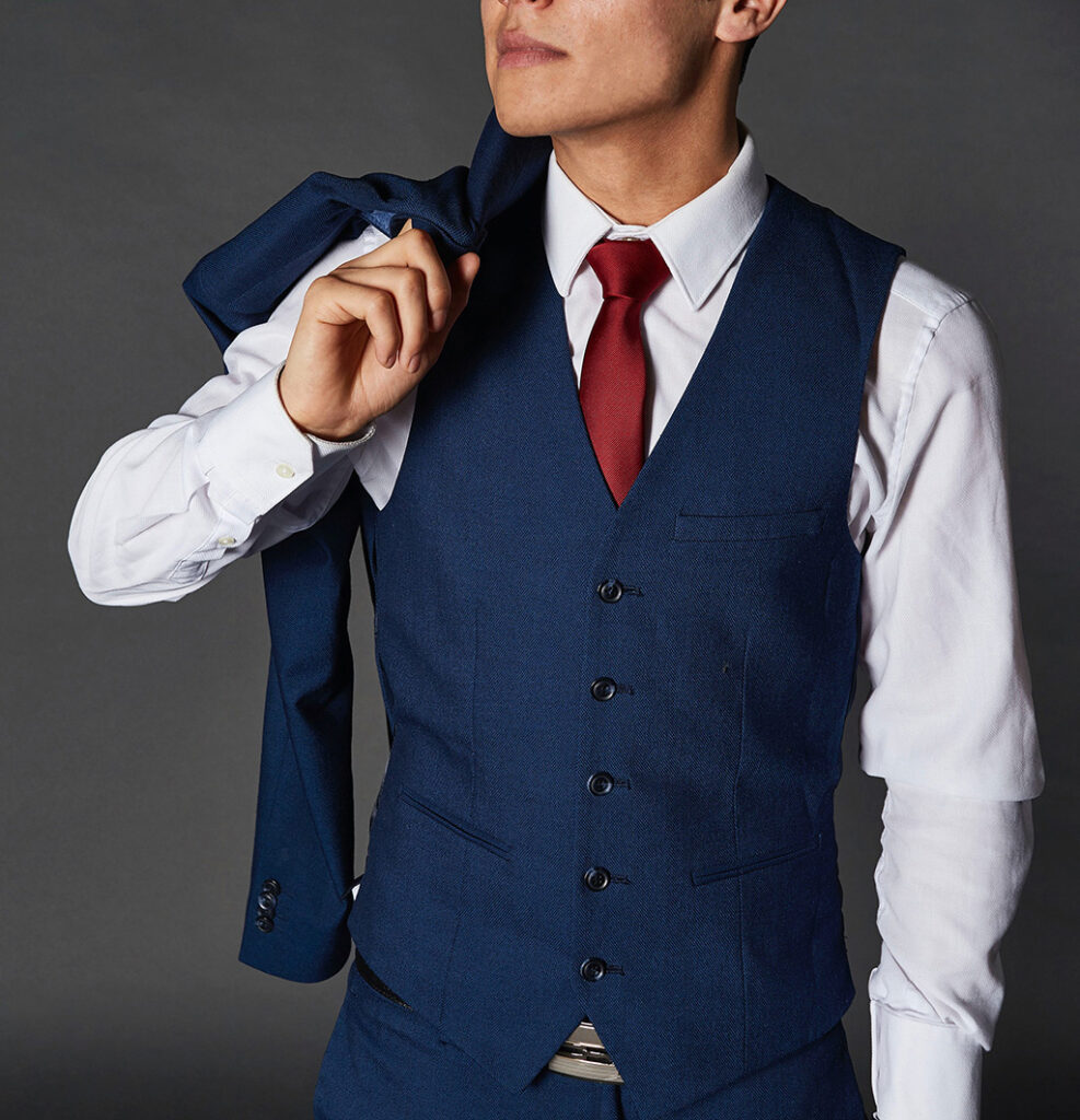 male model wearing blue business suit